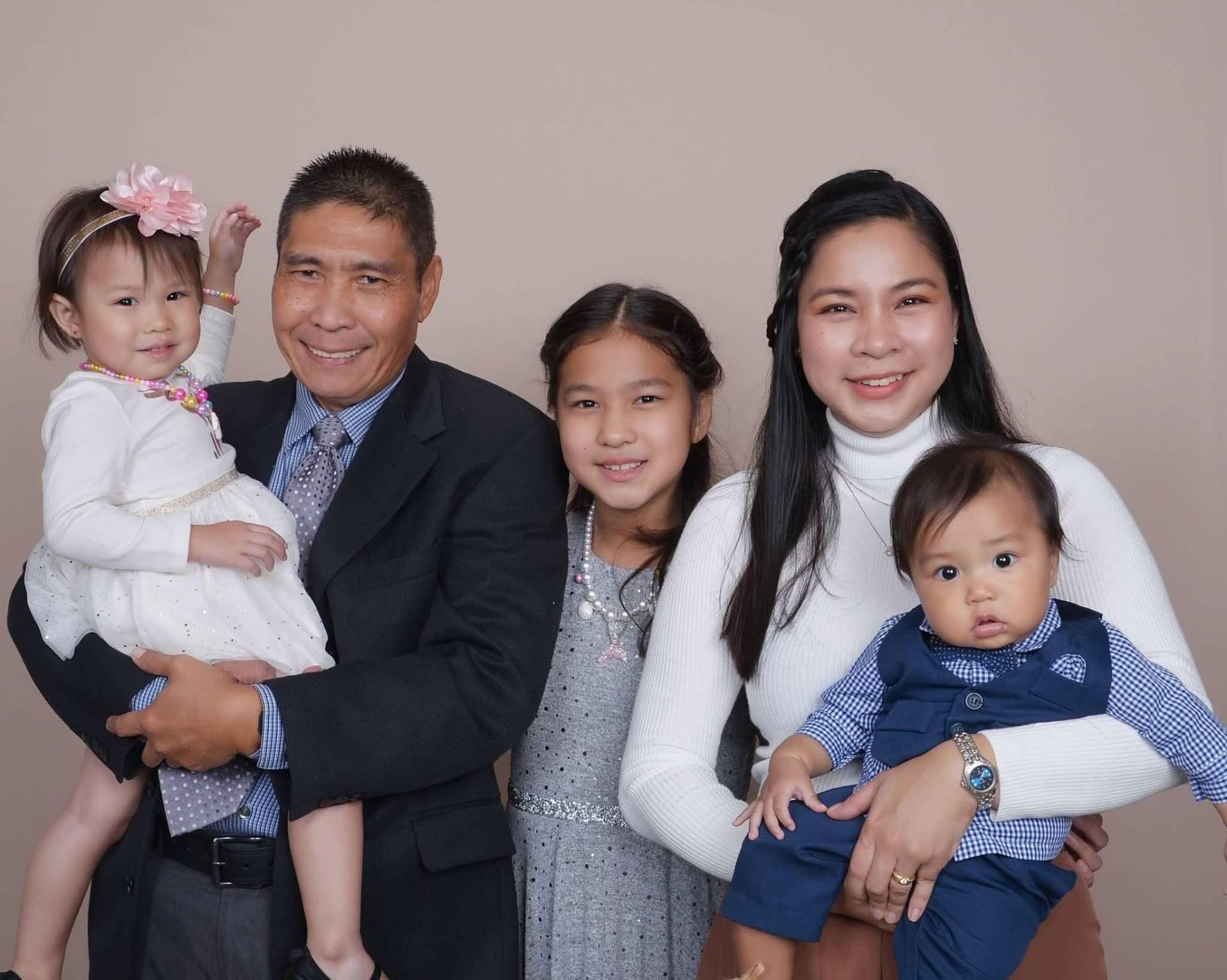 Posadas family standing together